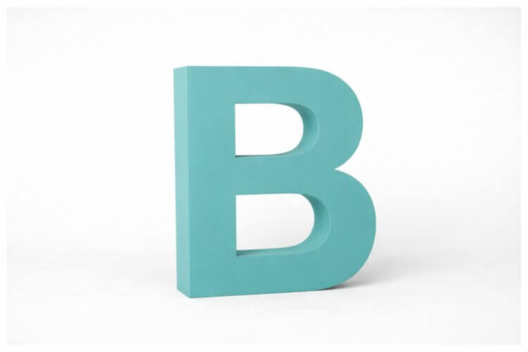 Türkiser Buchstabe B als Symbol für Bewegung in der ABC-Methode von Claudia Bouwens